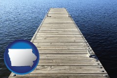 iowa map icon and a boat dock on a blue water lake