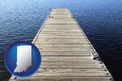 indiana map icon and a boat dock on a blue water lake