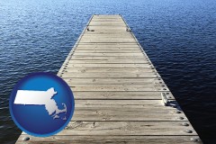 massachusetts map icon and a boat dock on a blue water lake