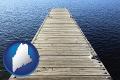 maine map icon and a boat dock on a blue water lake