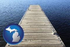 michigan map icon and a boat dock on a blue water lake