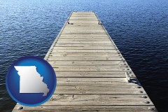 missouri map icon and a boat dock on a blue water lake