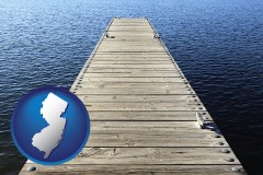 new-jersey map icon and a boat dock on a blue water lake