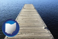 ohio map icon and a boat dock on a blue water lake